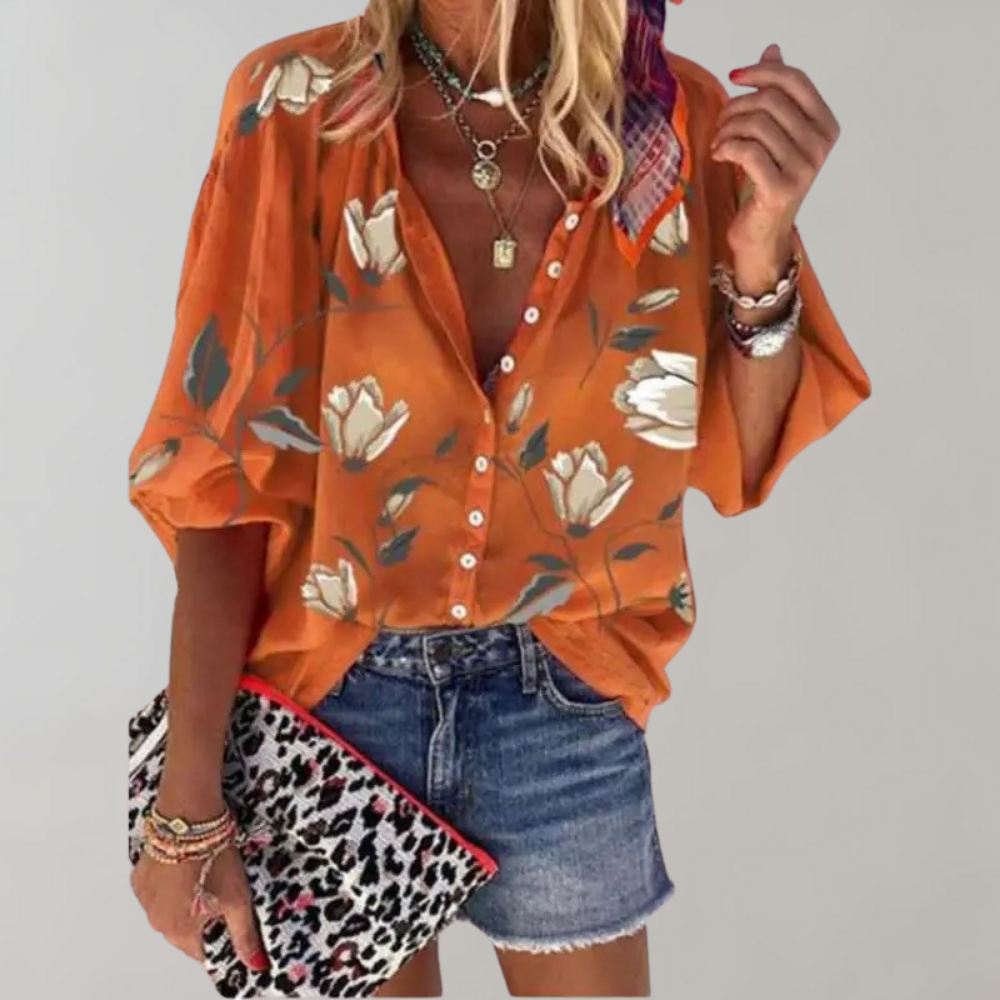 Oranje blouse met bloemenprint voor dames